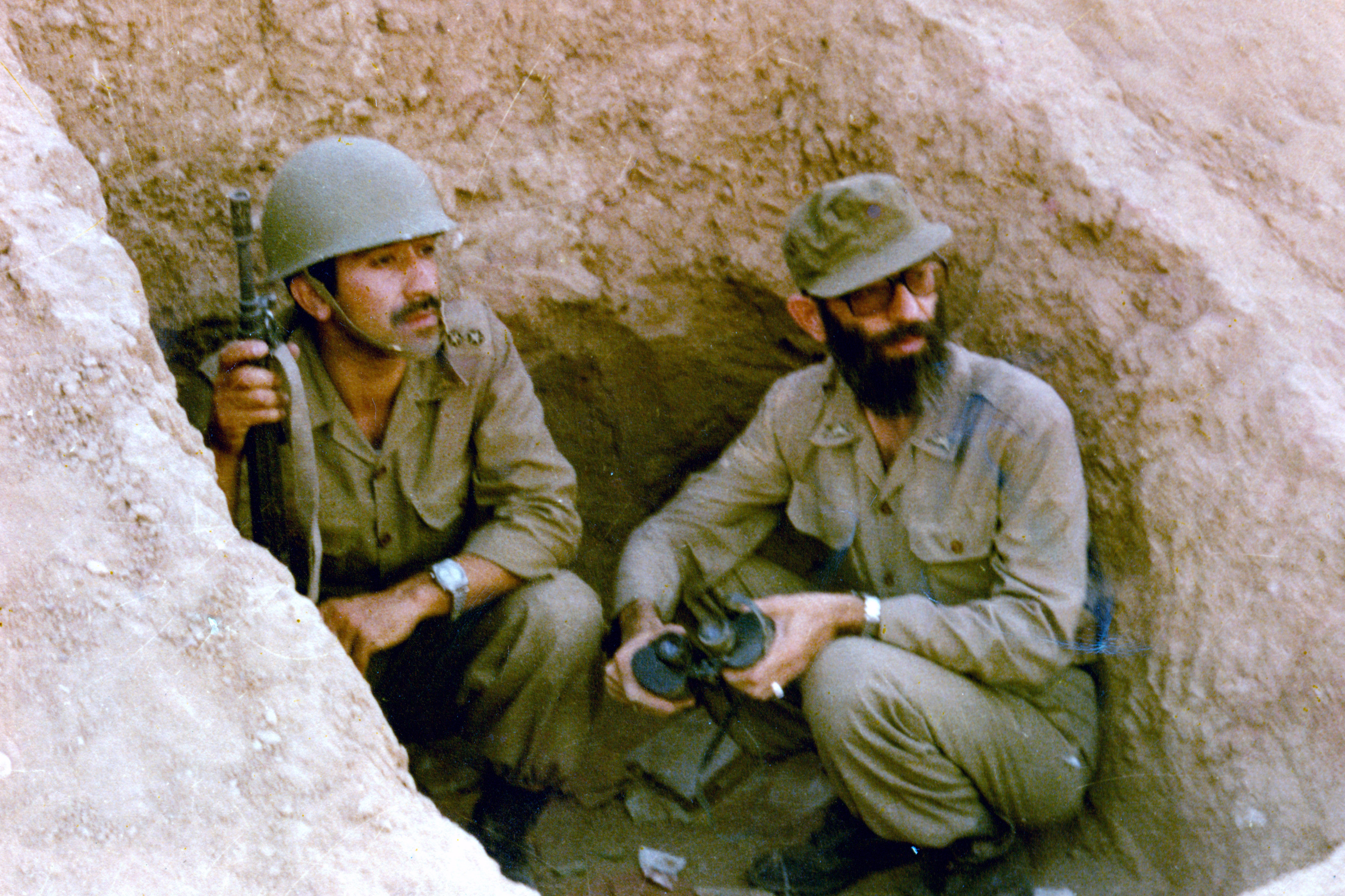 Ayatollah Khamenei in a trench at the front during the Iran-Iraq war